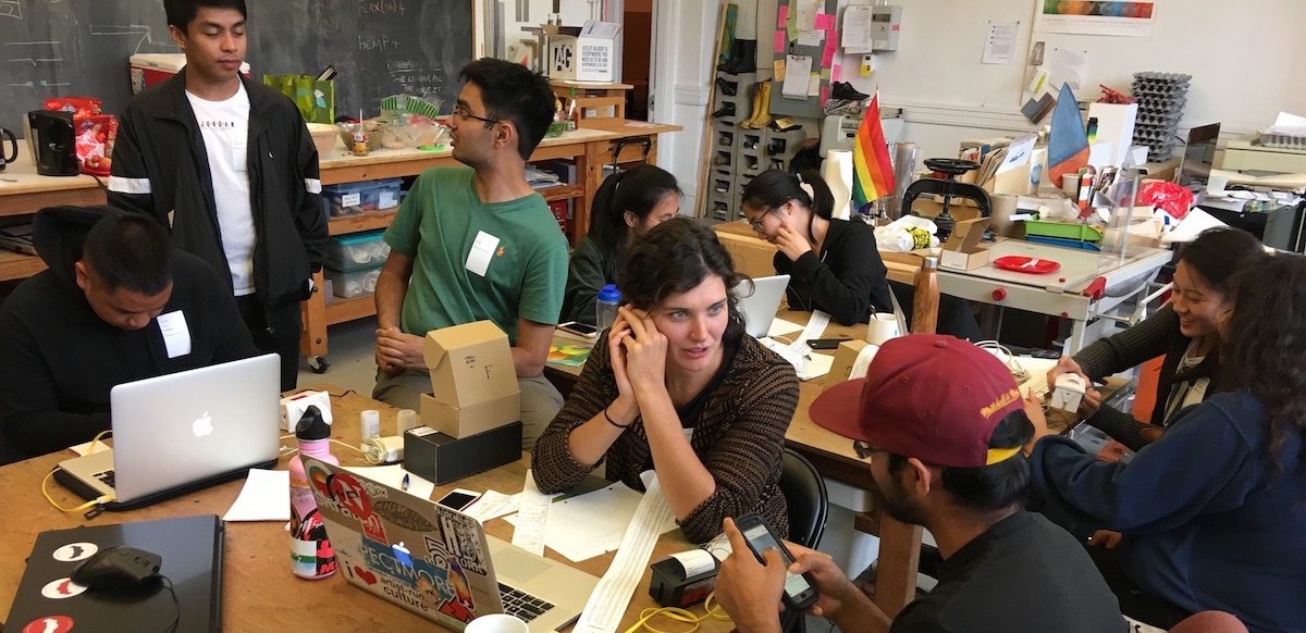 participants at a workshop in toronto experimenting with thermal printers